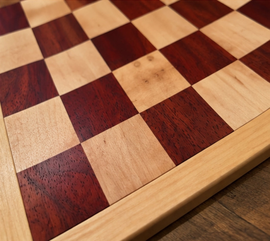 Close-up of handmade wooden chessboard squares